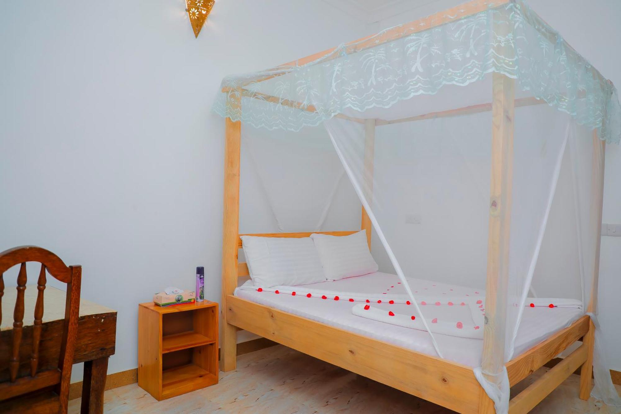 Bed and Breakfast Raha House Нунгви Экстерьер фото
